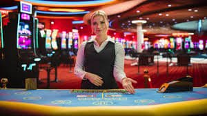 nslot99 account login and Free Fire World Series betting slip interface on Android mobile screen